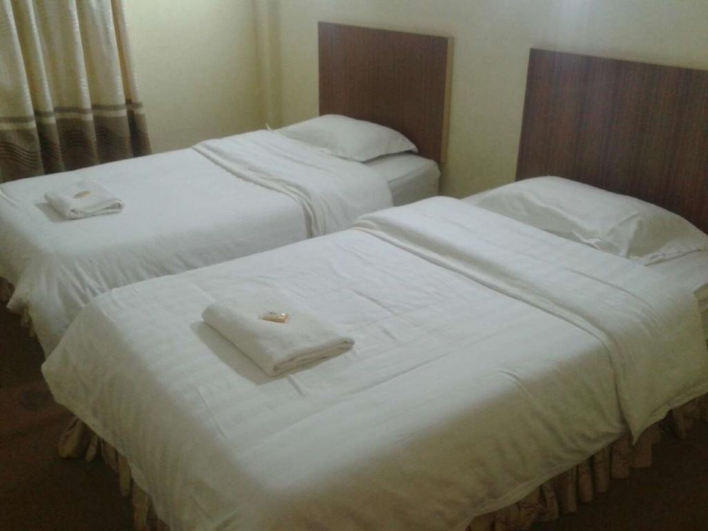The Garden Inn Miri Habitación foto